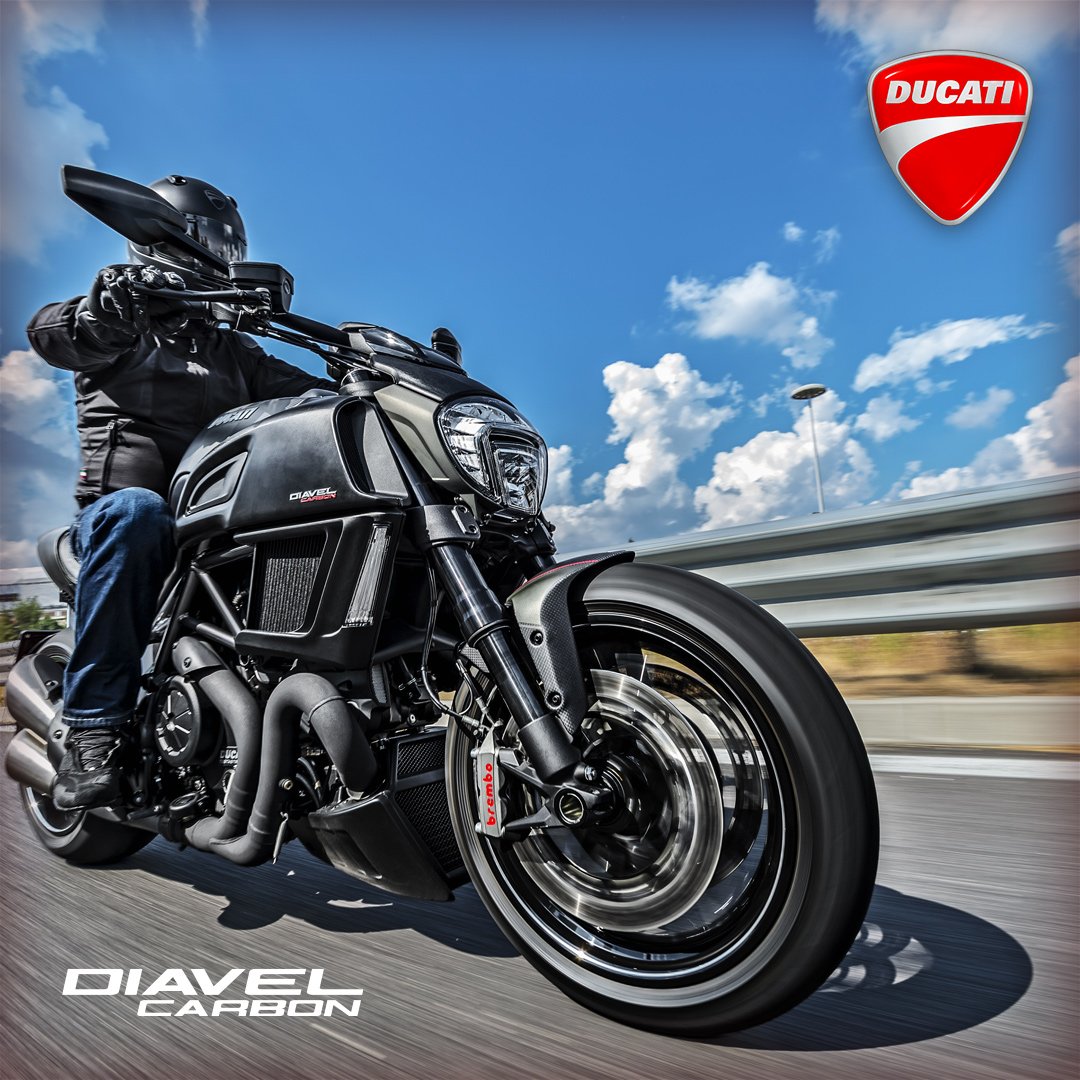 DucatiMotor's tweet photo. #DiavelCarbon: the world belongs to the bold. Discover the #Diavel range: https://t.co/xQo60z5kGH #DucatiBikes #Ducati2017 #Ducati https://t.co/mrmv4xrAjT