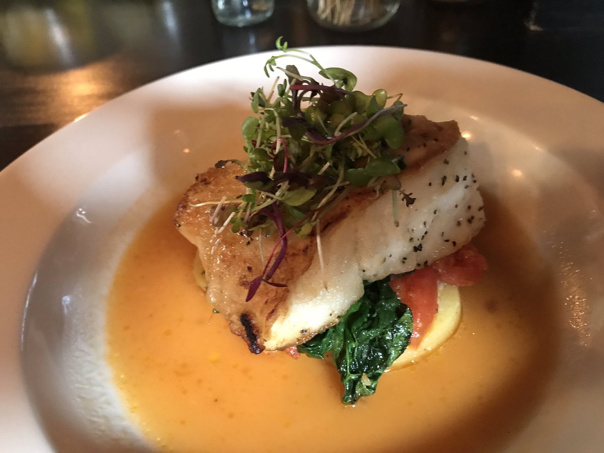 ParkandSixth's tweet photo. Pan roasted Chatham cod, Yukon gold oil poached potatoes, roasted tomato chutney, wilted spinach, tomato water @ParkandSixth https://t.co/V8zZqeV4Ig