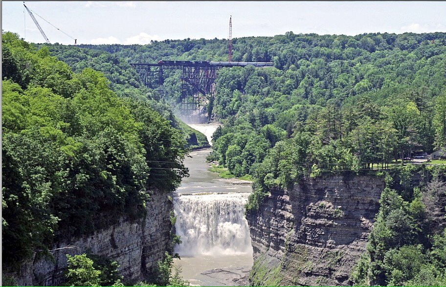 MassArt_Images's tweet photo. Finally captured a shot of a train crossing the 141 year viaduct of the Erie Railroad at #Letchworth State Park, NY. #Genesse #BucketList https://t.co/N49uNvo7Ar