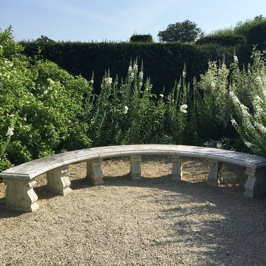 Lovely crescent shaped stone bench in the #white #flower #garden <a href="/LoseleyPark/">Loseley Park</a> @Loseleyevents - perfect spot for pics