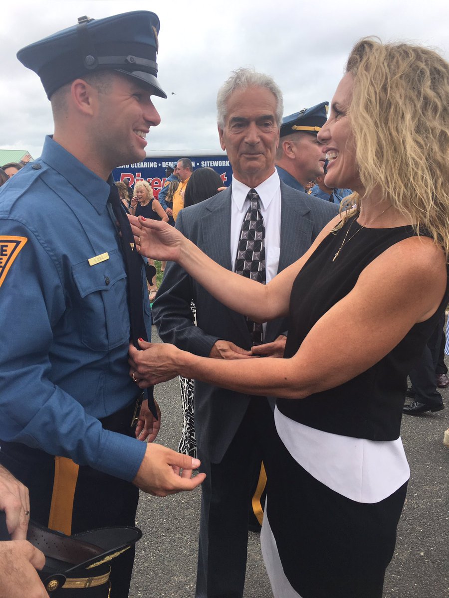 NJSP's tweet photo. #NJSP history-First time Trooper-Mom has ever presented a badge to a child! #TodayWillBeBetterBecause of this! https://t.co/KYJrJK3MFq https://t.co/kPuKbbIz6d