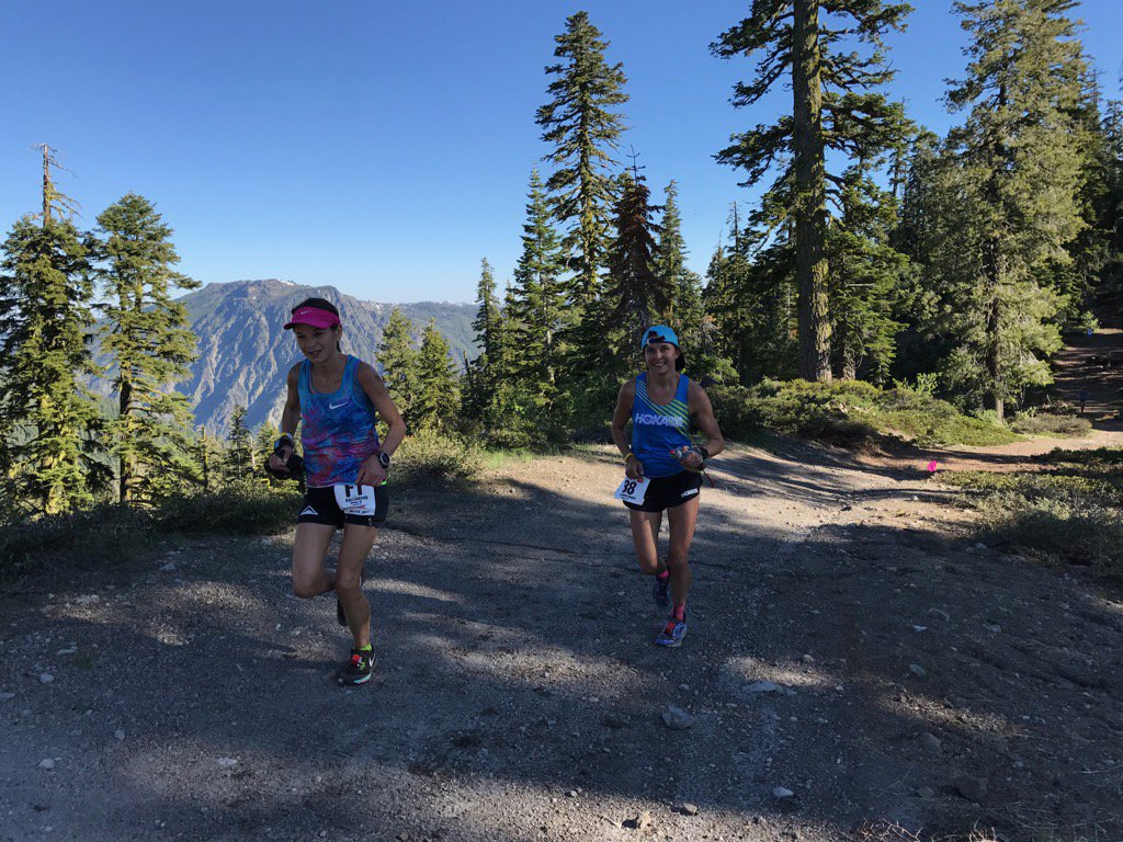 Kaci Lickteig and Magda Boulet smiling their way through Mile 15 - second and third ladies. +9 mins back. #WS100