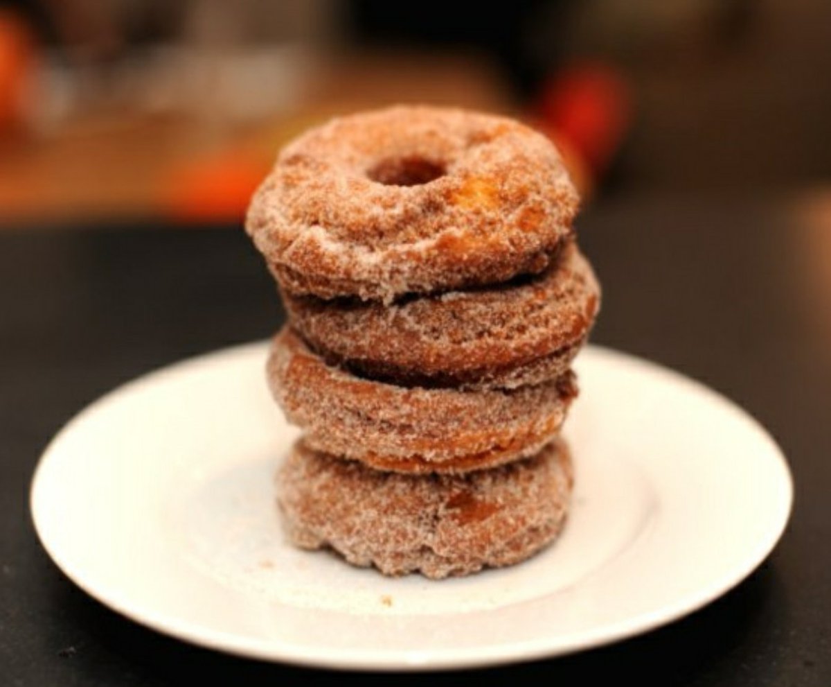 {Randomly hugs <a href="/PrinceOfPonies/">Pegasus</a> and offers homemade apple-cinnamon donuts coated in sugar.}