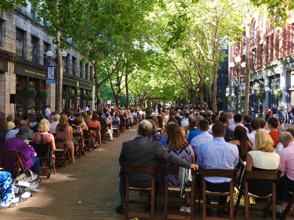 The city is their cathedral. Wedding at Occidental Square. #Seattle