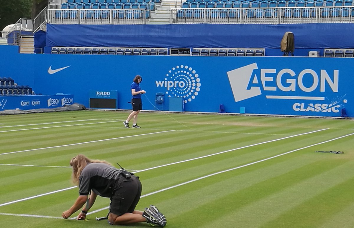 dave64jl's tweet photo. Mother and daughter putting the strings down ready for centre court to be marked by the husband and father. https://t.co/5mmb2qmGEs