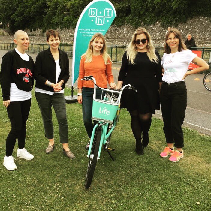 FuguPR's tweet photo. Fugu's Vicki and Mila with Caroline Lucas at #BNTBikeShare #BHTCycle 🚴🏼♀️🚴🏾 #hellobtnbikeshare #BTNBikeShare https://t.co/xlbr7rErFO