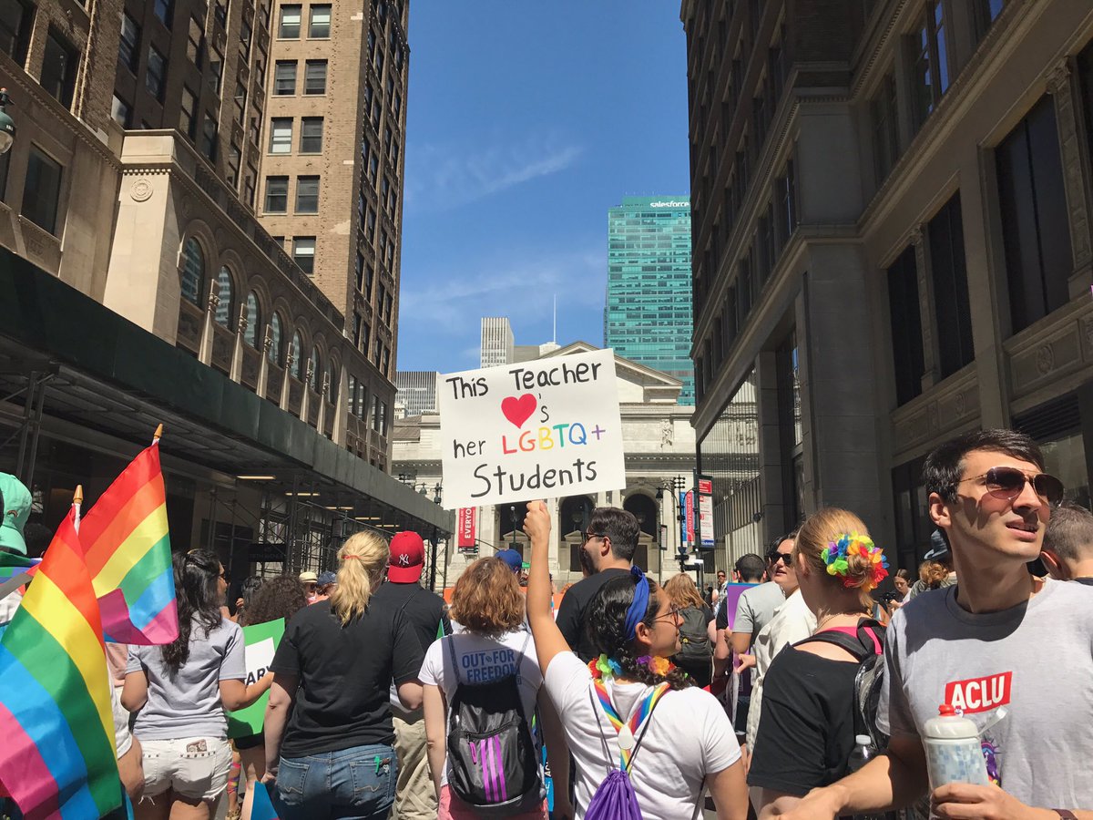 ACLU's tweet photo. An important message at #NYCPride2017 🌈⚖️ https://t.co/XuYW8yWPhK