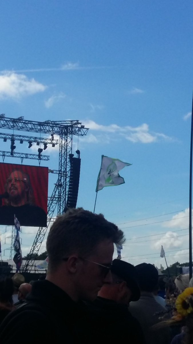 Our flag is now stationed at the pyramid stage held by our managing director. Keep an eye out for us #KhushiGlasto2017