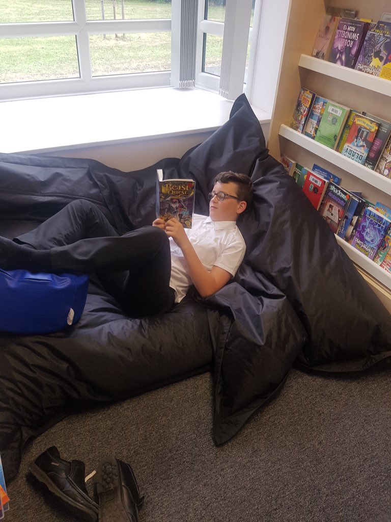 DeltaStWilfrids's tweet photo. Kenton taking advantage of our new 'reading for pleasure' area in the library #SWAsuccess #SWAliteracy https://t.co/25SEB93QEJ