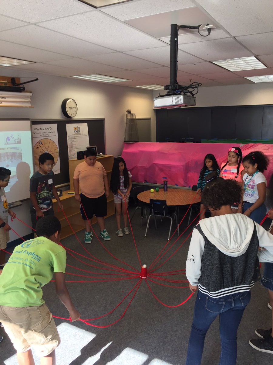 Working together for our first team building challenge! #APSInnovAcademy <a href="/APSTitleI/">APS Title I</a>