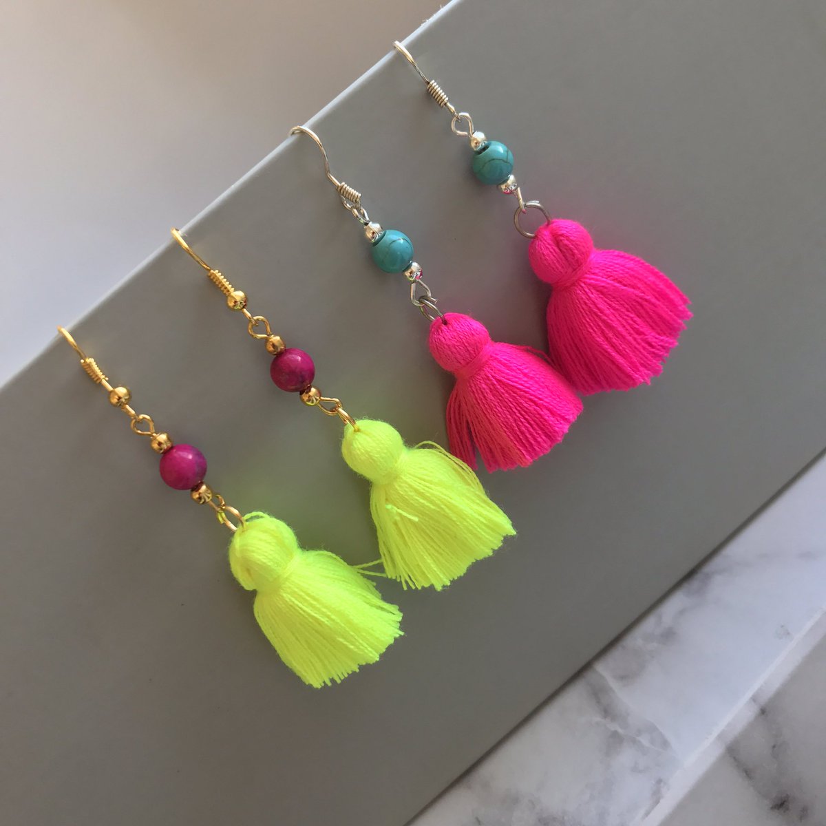 Neon Tassels! Shop here....www.thedottylemon.com