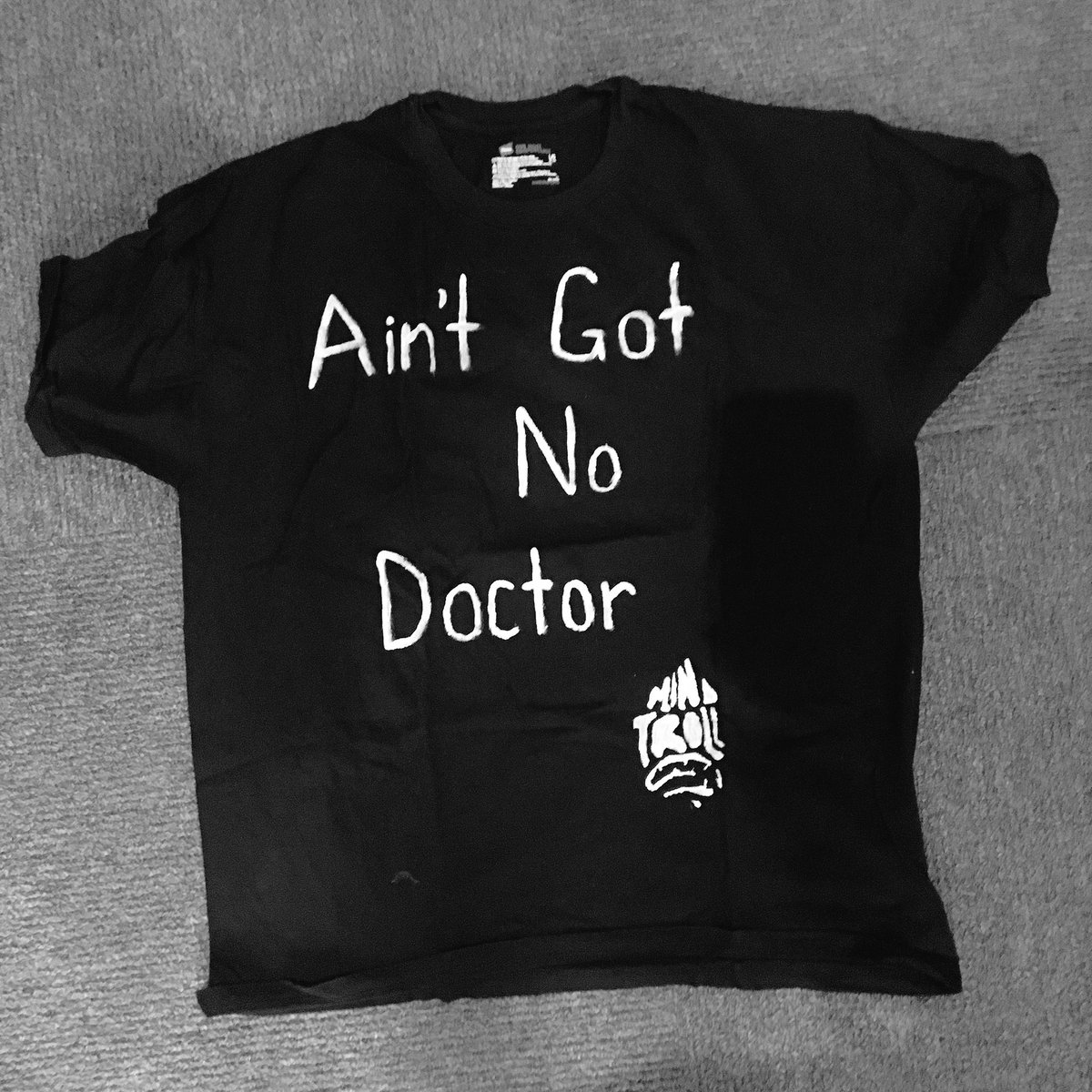 mindtrollintern's tweet photo. Cleaning out the MINDTROLL closet &amp; came across this old shirt. Seems like the new healthcare policy was inspired by a lyric from Sewer Baby https://t.co/6UWsKyaPu7