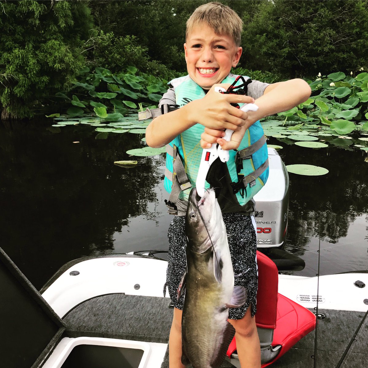 We got a surprise this evening in the lilly pads. Shooter was straining to hold it up. #fishing #fishfamily