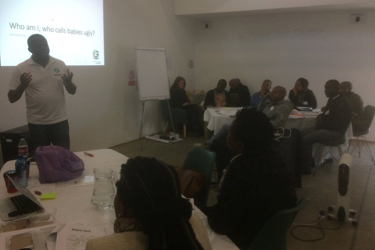 BizCre8's tweet photo. Doc Magondo of @WIBCInnovation helping #BizCre8 #Ide8 entrepreneurs understanding the concept of a business model #Entrepreneurship #youth https://t.co/XNzjAET7kO