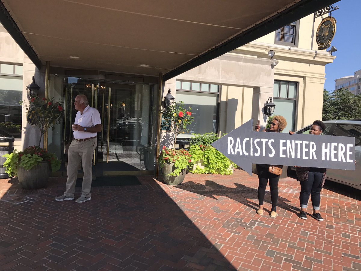 ConMijente's tweet photo. BREAKING: anti-immigrants tried to meet with the white supremacist group FAIR in secret in dc. We had an unwelcome for them. #DCvsHate https://t.co/AevL2ISHBx