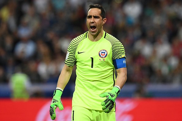 BBCSport's tweet photo. Chile score their first three, Claudio Bravo saves all three penalties he faces.

Chile are in the final! 
👉 https://t.co/4WYf1yFQhR https://t.co/eHX017QsSl