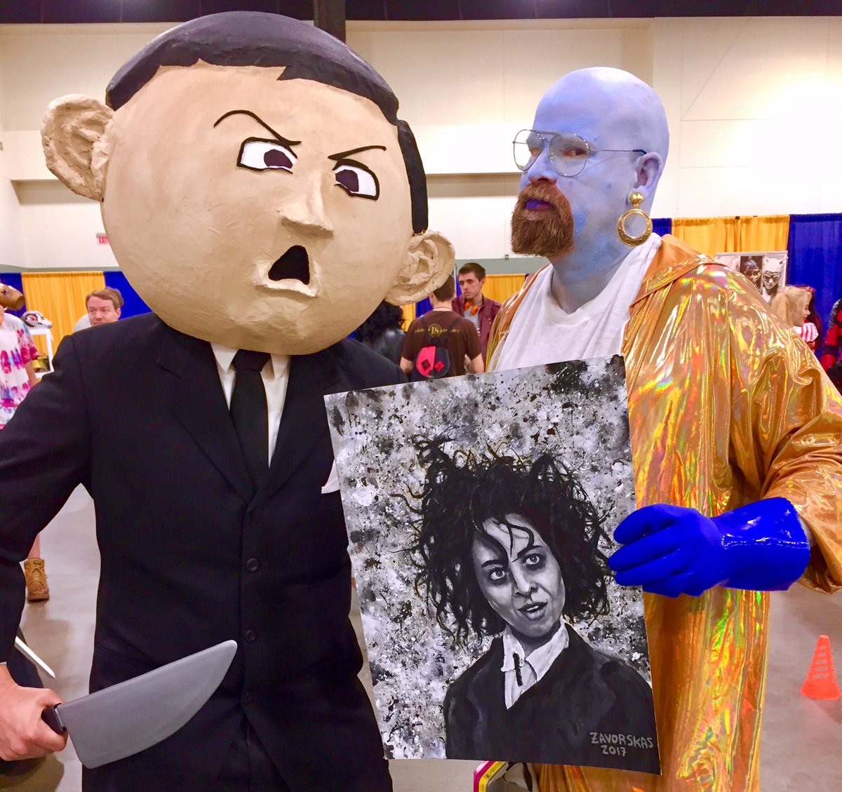 ZombieLeader1's tweet photo. When @LegionFX's The Angriest Boy in the World admires your painting of his boss, @evilhag, at @MassiveComiccon! https://t.co/F5qx0BBbLn