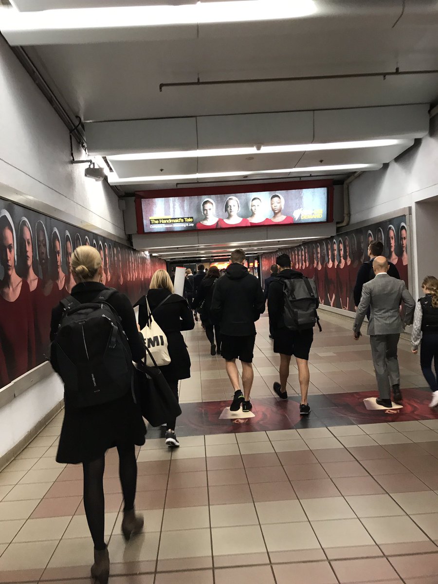 NicRogerson's tweet photo. Kudos @SBS Martin Place in Sydney. #Handmaids #StayWokeLadies #Nolitetebastardescarborundorum https://t.co/LCT91MT6w9