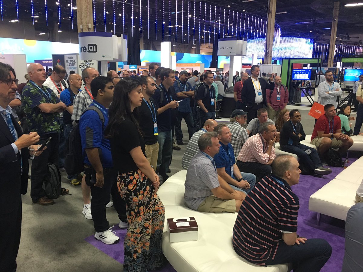 Tolga_Sakman's tweet photo. Vemun Waksvik of @SynergySKY explaining to a standing room how to improve UX in booking and launching calls in multi-vendor environments. https://t.co/g0dxHUIjiZ