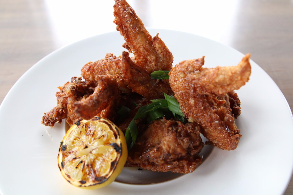 Who doesn't like wings. | Signature Brine, Honey Ginger Glaze, Garlic, Chili Flakes, Sliced Scallion, Grilled Lemon. #CuredWineBar #yegfood