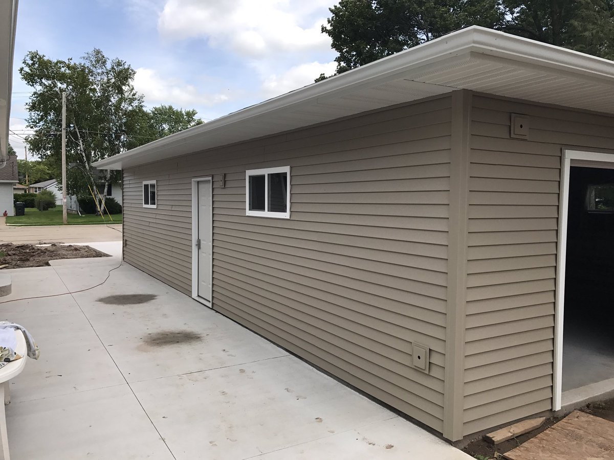 Just finished this little beauty in Kaukauna 28' by 40' detached garage should have plenty of room for the lawn mower. Call for yours today.