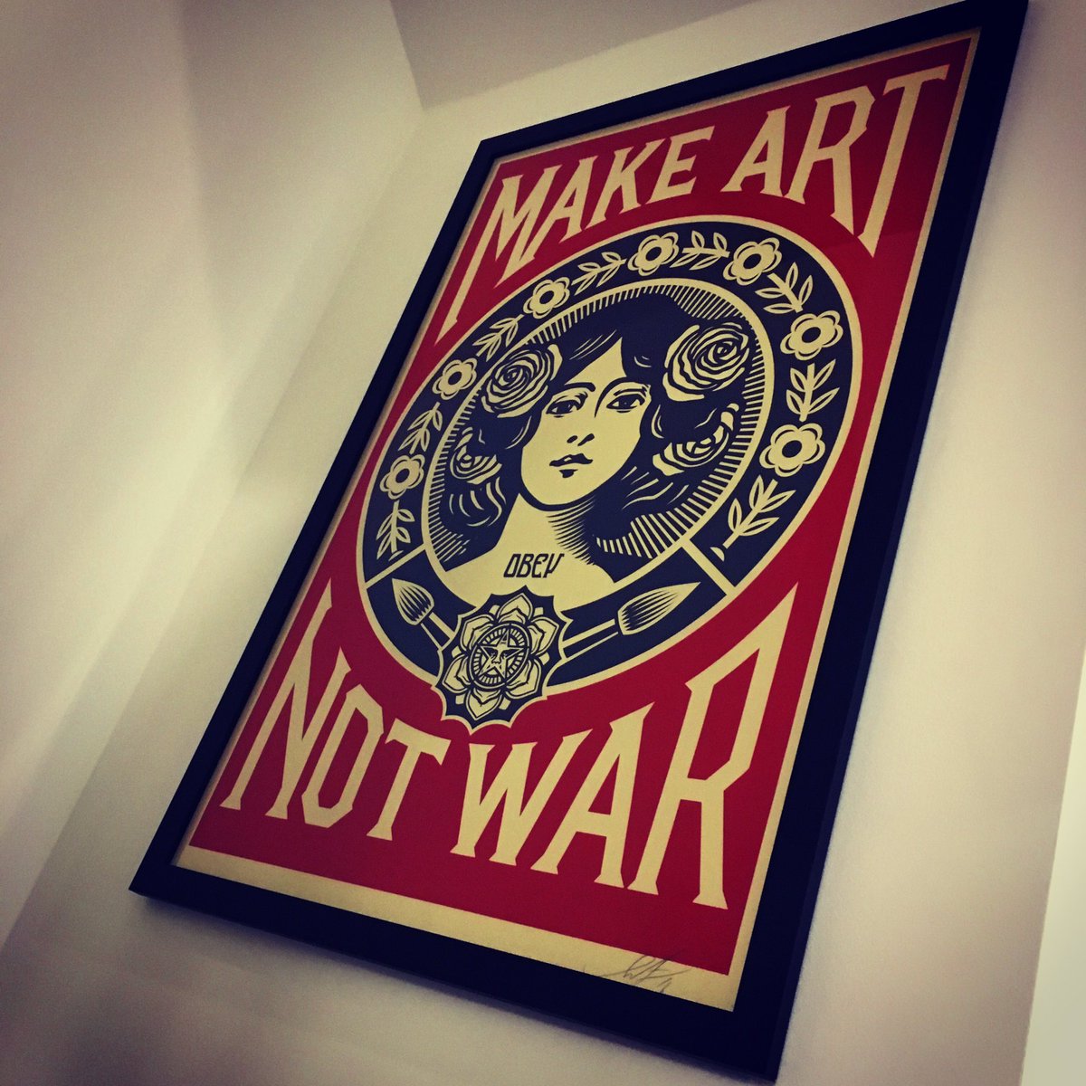 CaffreyDesign's tweet image. Signed print finally up on the wall! 
A timeless message more relevant today than ever!

#makeartnotwar #obey #poster #screenprint #art