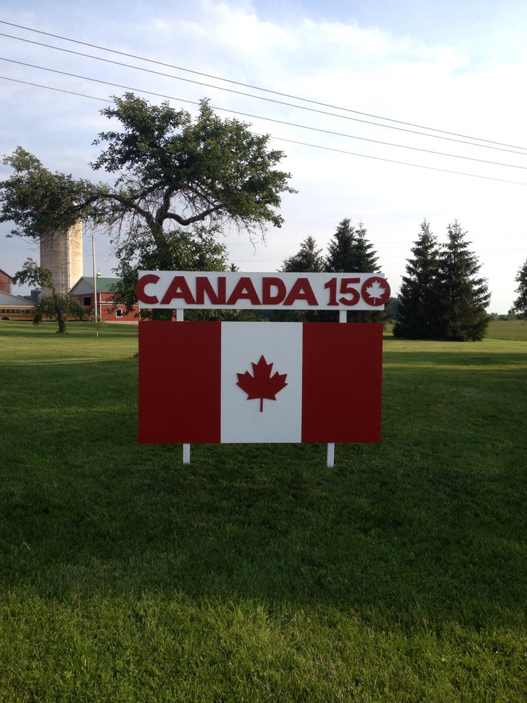 wathkealex's tweet photo. New road signs for Canada Day 150th https://t.co/IiCVCNdL8H
