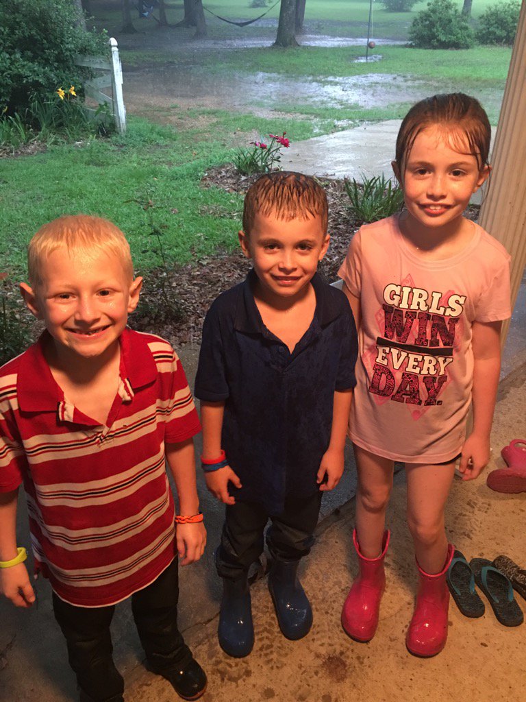 WillButterfield's tweet photo. Sometimes it starts raining when you're feeding the chickens. Luckily these kiddos didn't care. #lafarmproud #lfbf17 https://t.co/1hb3E24UNZ
