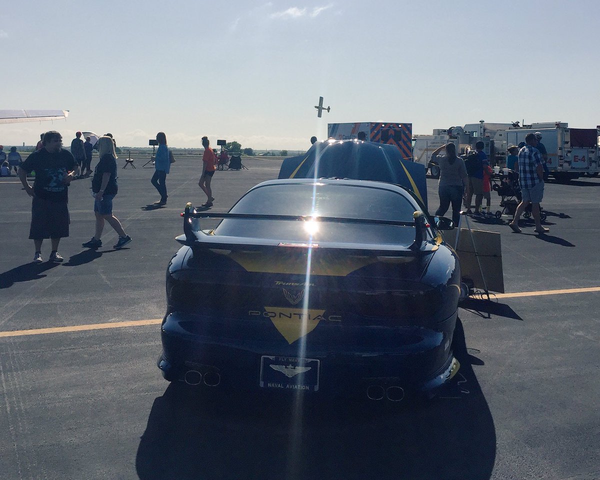 Russell Husbands in blue and yellow Super D passes in front of #Angel9 at <a href="/GrandTXAirshow/">Grand Texas Airshow</a> 💙💛