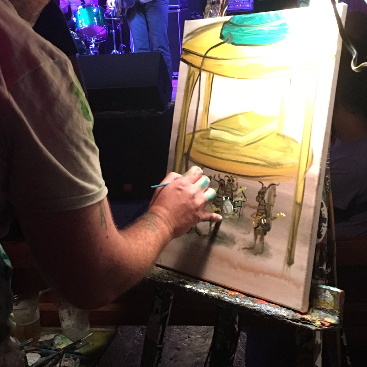 And Dogmatic is here, seen finishing his live art painting of the Roaches of Red Bank.