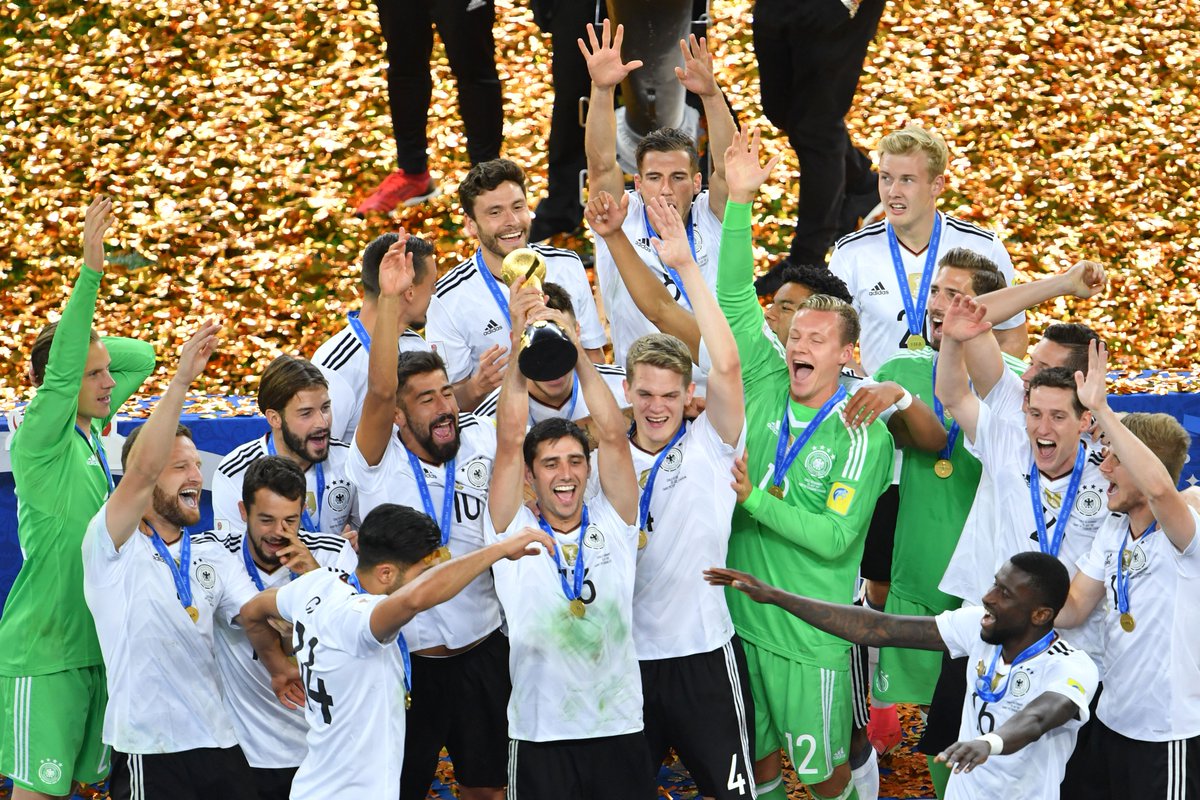 DFB_Team_EN's tweet photo. The winning goalscorer gets his hands on the trophy. Thank you, @stindl28 🙏 #DieMannschaft #ConfedCup https://t.co/PJciq203SC