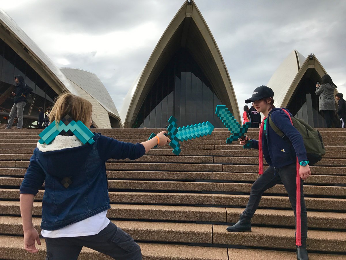 leoniemjones's tweet photo. What better way to finish a day of #Minecraft battles than with a final Diamond Sword joust on the steps of @SydOperaHouse?! #SOHMinecraft https://t.co/5FhGT588Hi