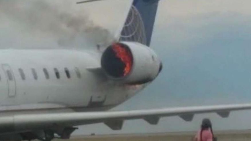 FoxNews's tweet image. United Express plane catches fire upon landing at Denver airport, no injuries reported  fxn.ws/2sD2Tt0