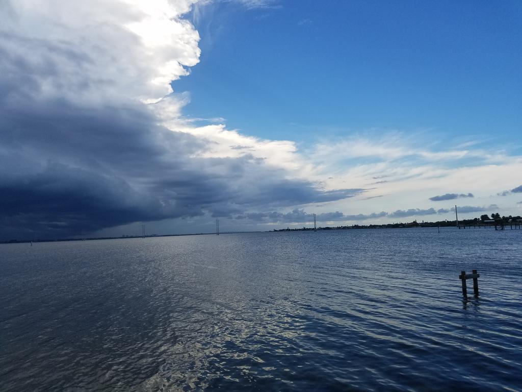 Chris561971's tweet photo. My Vacation spot.. Storm is across the river.. LOVE a sky with soul... #summerstorms #lovefl #staycation https://t.co/2yHIQCOSYM