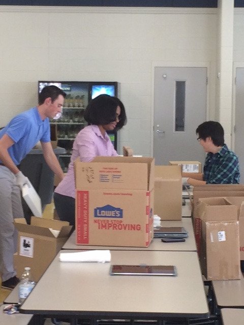 ACS_System's tweet photo. OUR awesome ACS Tech Team is preparing for the distribution of our iPads for OUR 5th – 12th graders! #redefiningteachingandlearning https://t.co/RpFrqwgwlP