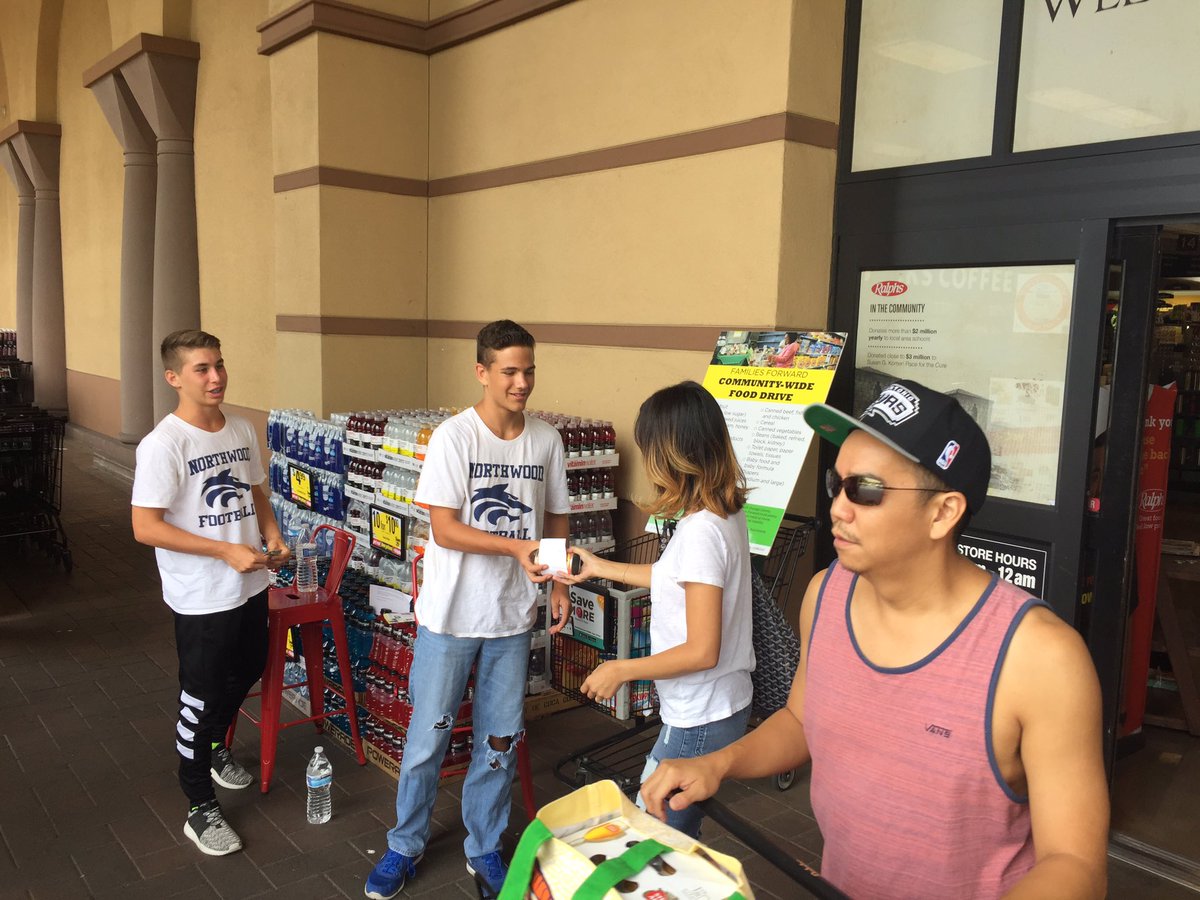 NHS Football players GIVING BACK &amp; helping to feed the hungry in OC through Families Forward with 3 Carloads of food!!