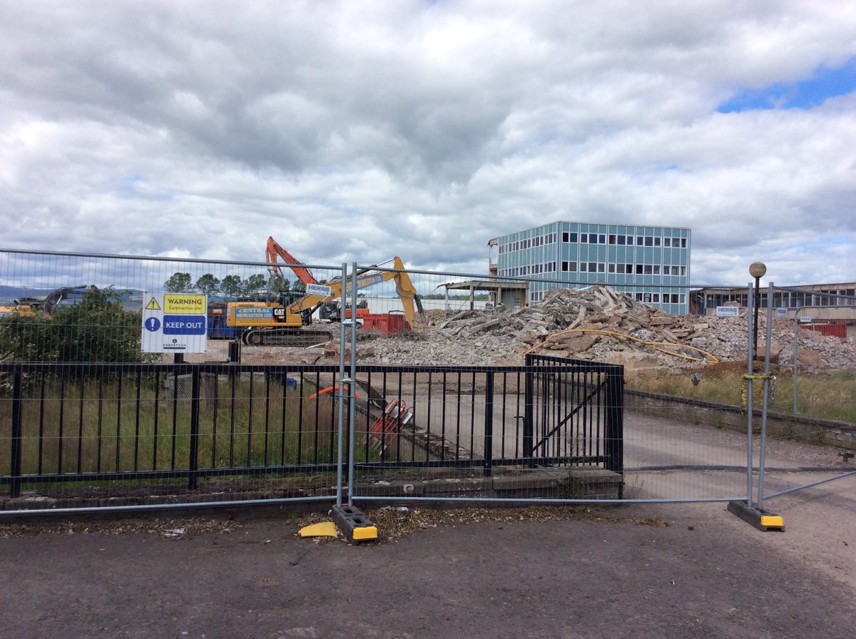 ForAcad's tweet photo. Landscaping at new campus proceeds apace, wi a big machine that is currently eating the old school and spitting it oot in rubble. #heyfred https://t.co/dhxozLeiZE
