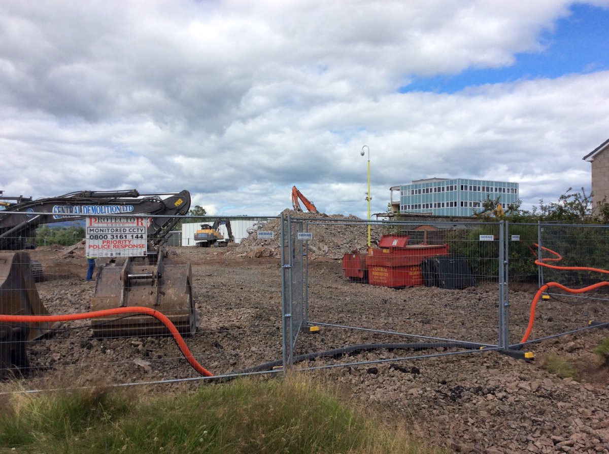 ForAcad's tweet photo. Landscaping at new campus proceeds apace, wi a big machine that is currently eating the old school and spitting it oot in rubble. #heyfred https://t.co/dhxozLeiZE