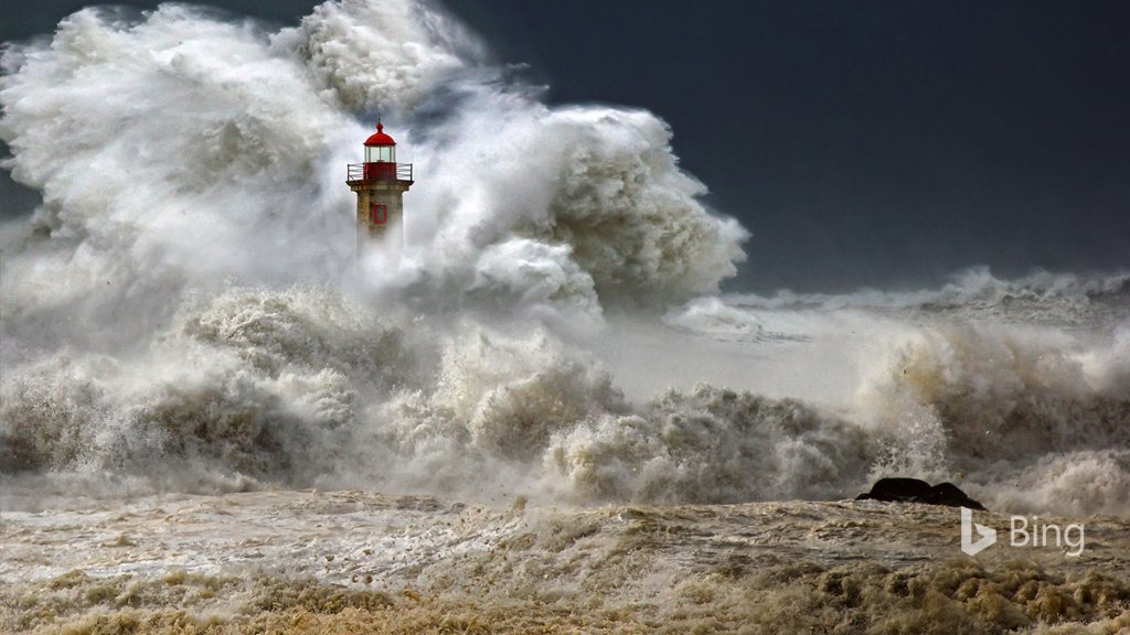 Farolim de Felgueiras, a lighthouse, braves the waves in Porto, Portugal. Bing.com