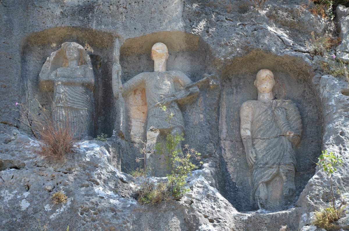 carolemadge's tweet photo. Roman-era rock reliefs carved in the walls of a shallow ravine in the necropolis of Kanytelis #Cilicia. The reliefs depict the deceased. https://t.co/VENDNp7Ofp