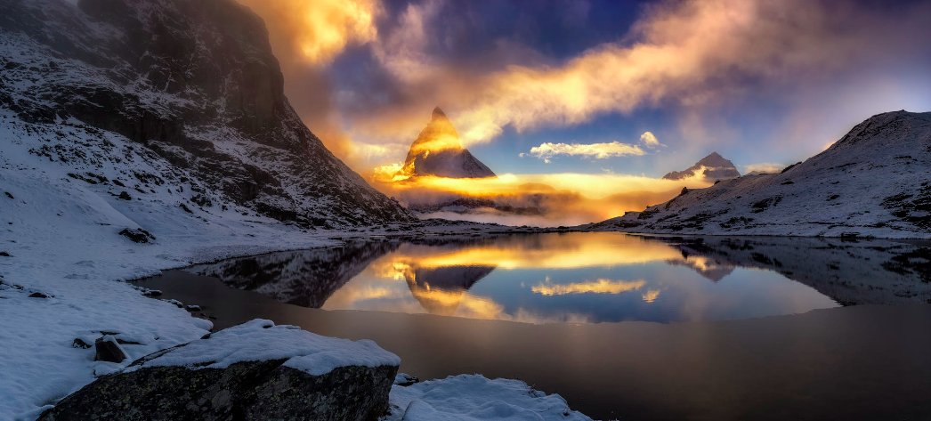 Good afternoon, "Fire of Desire" by Timothy Poulton. #landscapephotography #travelphotography #sunset #lake #switzerland #NaturePhotography