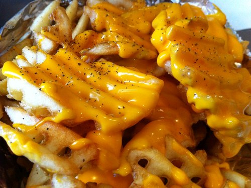 CuIinaryAddict's tweet image. Cheesy Waffle Fries!