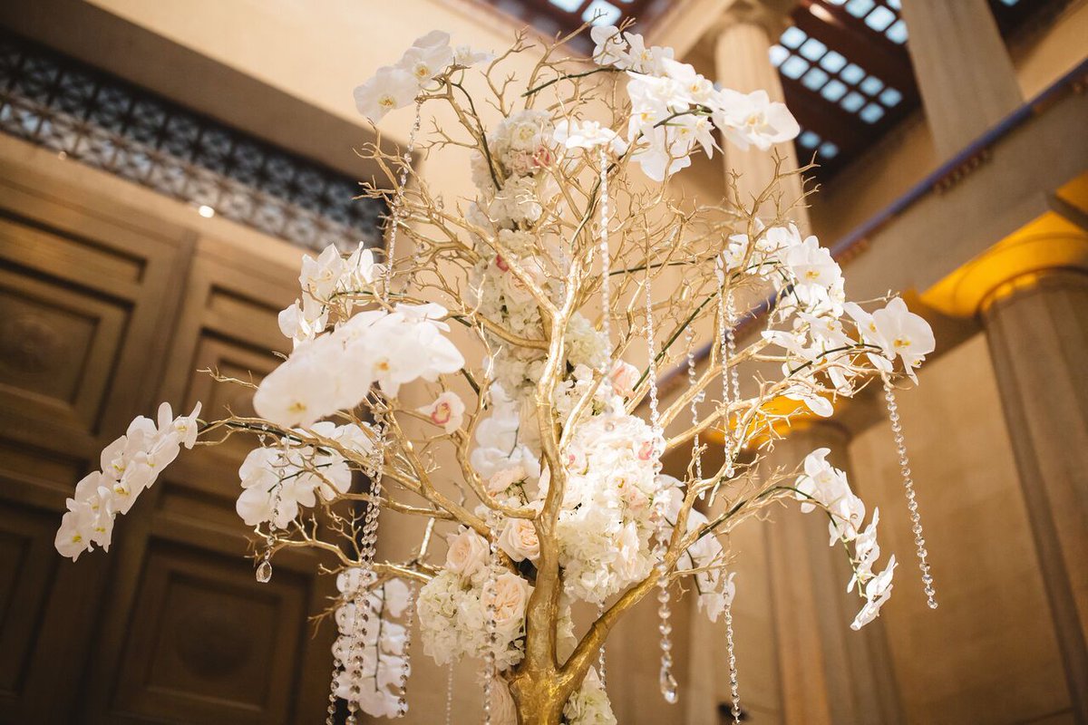 At Elliott Events, we love creating unique centerpieces! This tree was dripping in jewels and orchids! Elliott Events. Parker Young