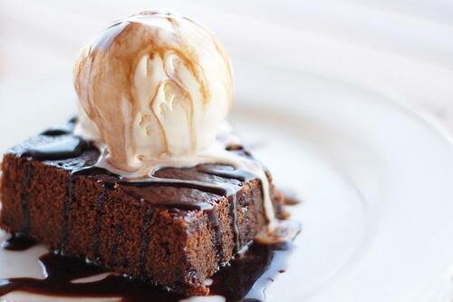 Ice cream topped brownie.