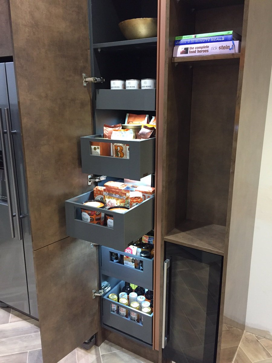 LDL_online's tweet image. A @blum #SpaceTower installed in @kitchenliv The Legrabox in Orion Grey looks great with the copper finishes.