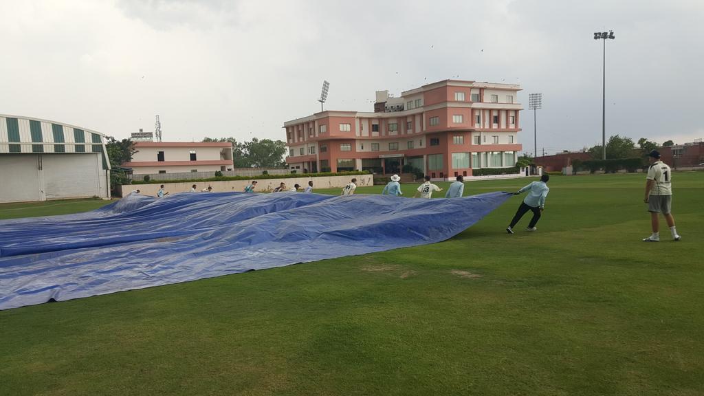 NSB_Sport's tweet photo. Our lads then got stuck in with the grounds staff as the heavens opened! #tourspirit #india17 #dogs https://t.co/y10LE2EpYx