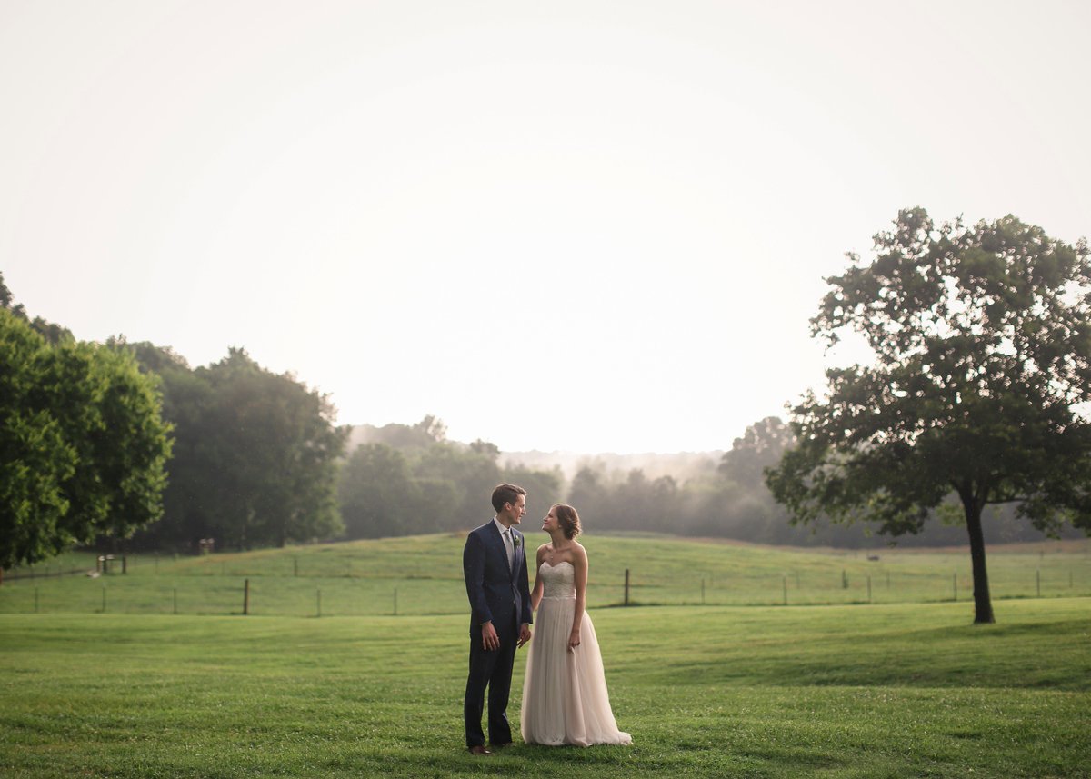 This happy couple tied the knot at The Dairy Barn last weekend &amp; didn't let the rain stop them from getting beautiful shots! <a href="/AmarisPhoto/">Amaris Photography</a>