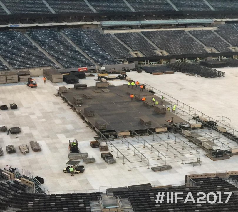 IIFA's tweet photo. A captivating stadium where stars will descend to captivate hearts! The #IIFA2017 stage is under progress to witness the magic of Bollywood. https://t.co/DvRj8EP7PD