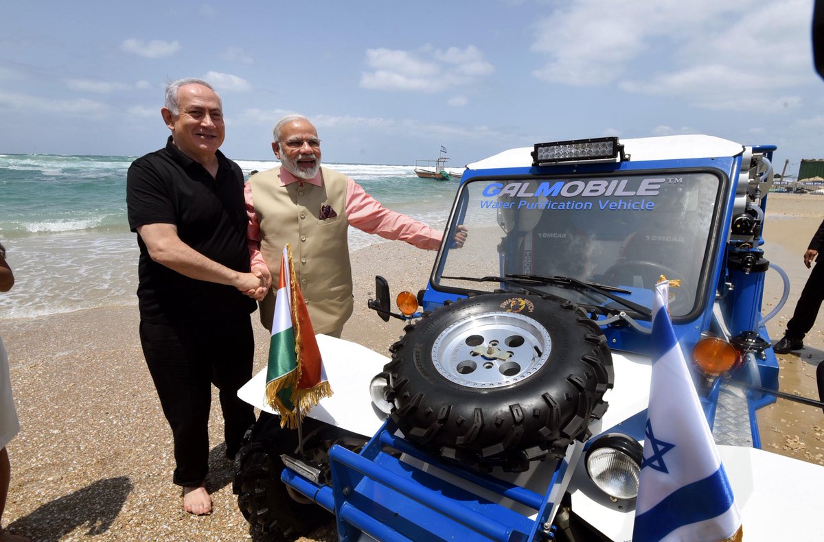 Netanyahu Modi Beach In Pics: On last day in Israel, PM Modi and 'friend' Netanyahu make ...