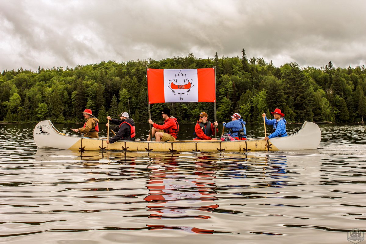 150_for_150's tweet photo. Flag raised high paddling across Canoe Lake. #150for150 #PaddleON https://t.co/VHiQr8pRMM